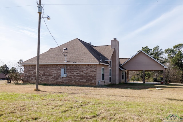 view of property exterior with a yard