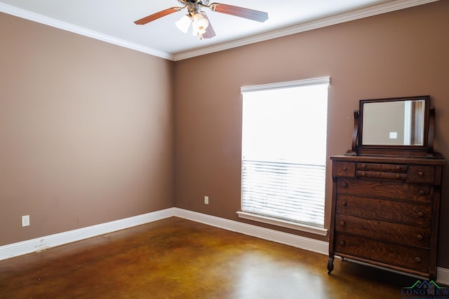 interior space featuring ceiling fan, ornamental molding, and concrete flooring