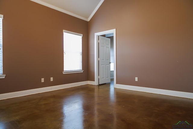 spare room with lofted ceiling and ornamental molding