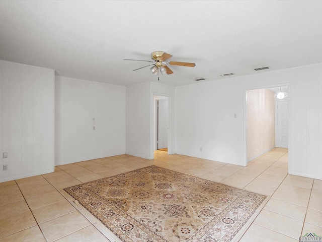1102 Blueridge Pkwy, Longview, TX 75605 - empty room with ceiling fan, visible vents, and light tile patterned flooring
