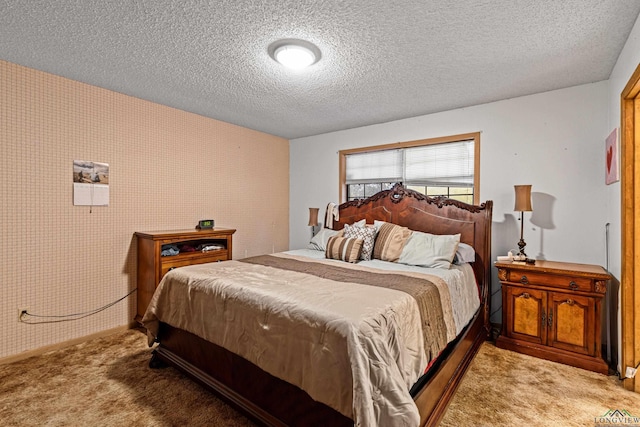 carpeted bedroom with a textured ceiling