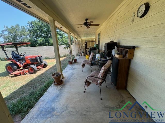 view of patio / terrace featuring ceiling fan