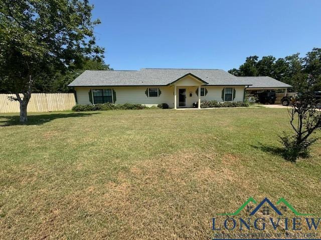 ranch-style home with a front yard