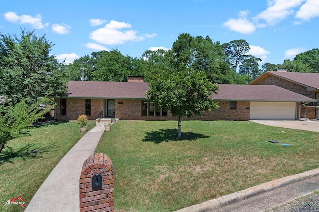 2804 Palm Plz, Marshall, TX 75672 - ranch-style house with a garage, a front yard, brick siding, driveway, and a chimney