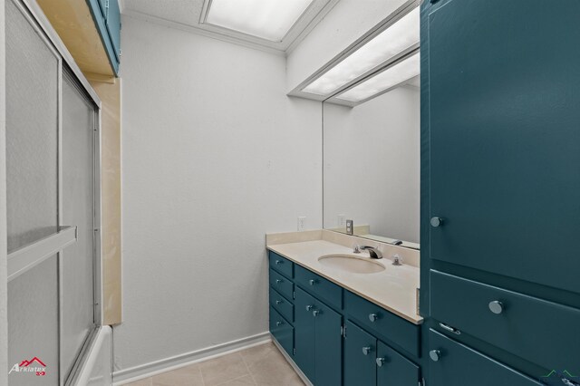 2804 Palm Plz, Marshall, TX 75672 - full bath featuring vanity, tile patterned floors, and baseboards