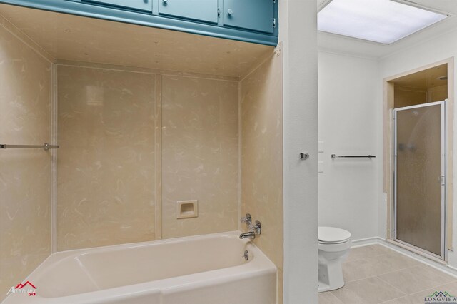 2804 Palm Plz, Marshall, TX 75672 - bathroom with toilet, tile patterned floors, and  shower combination