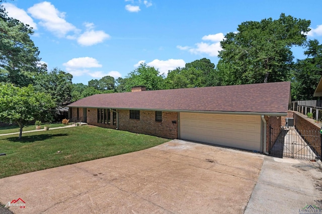 2804 Palm Plz, Marshall, TX 75672 - view of front of house featuring concrete driveway, an attached garage, brick siding, and a chimney