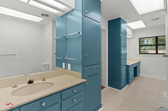 2804 Palm Plz, Marshall, TX 75672 - full bathroom featuring vanity, tile patterned floors, and toilet