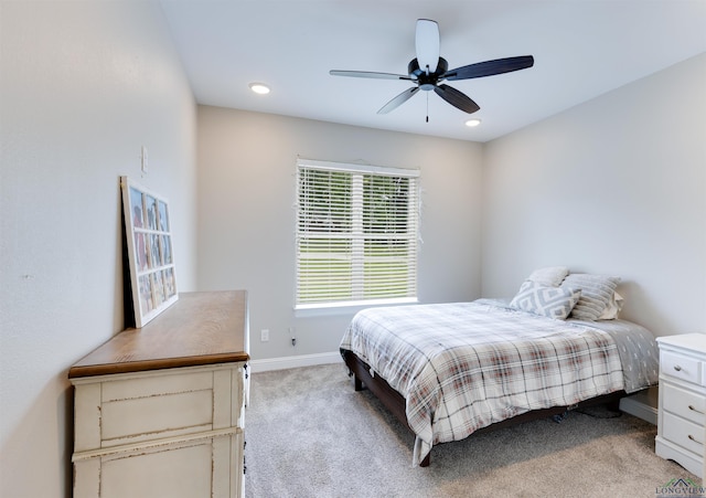 bedroom featuring recessed lighting, ceiling fan, baseboards, and light carpet