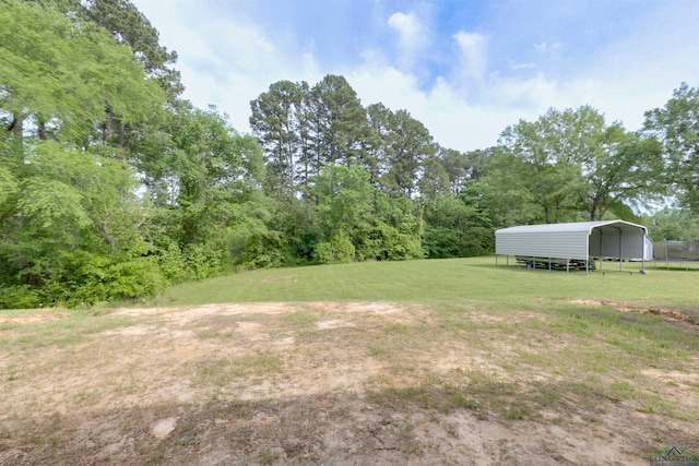 view of yard featuring a carport