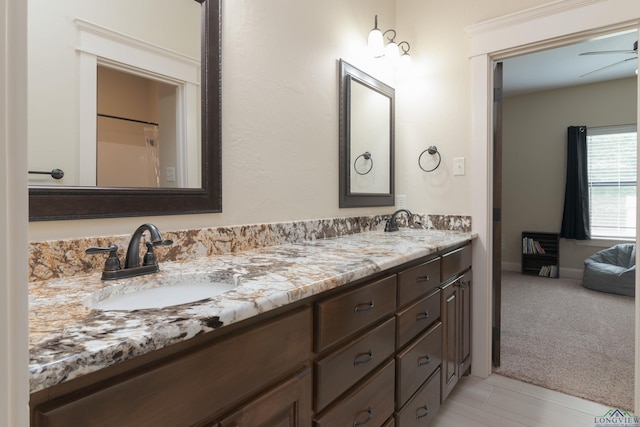 bathroom with vanity and ceiling fan