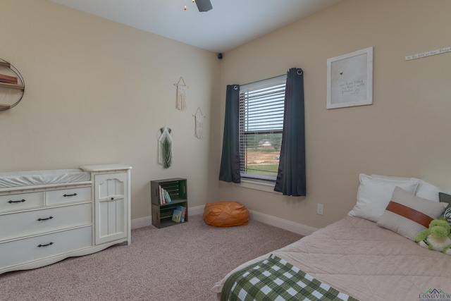 bedroom with light carpet and ceiling fan