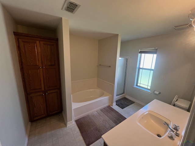 full bathroom with vanity, toilet, and shower with separate bathtub