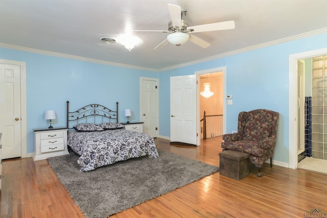 bedroom with connected bathroom, ceiling fan, and crown molding