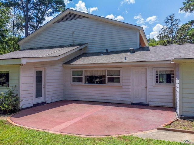 rear view of property with a patio