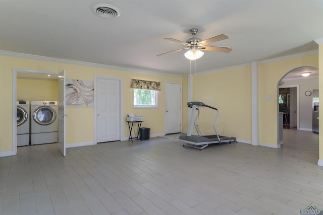 workout room featuring separate washer and dryer, ceiling fan, and ornamental molding