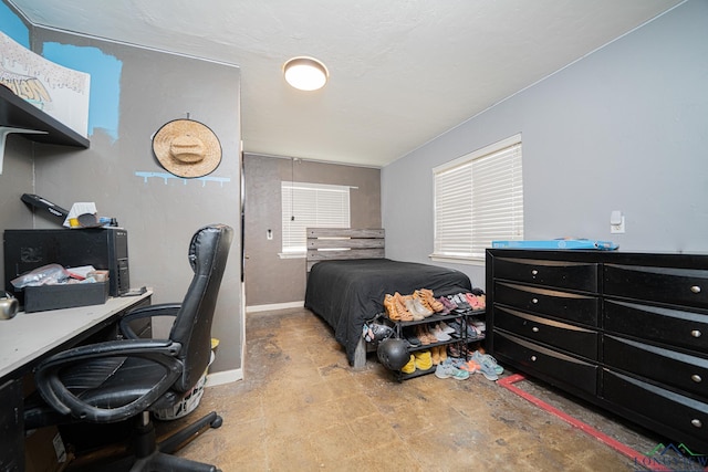 bedroom with baseboards