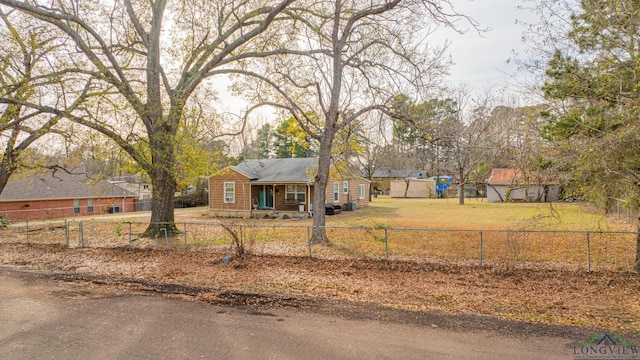 view of front facade with fence private yard