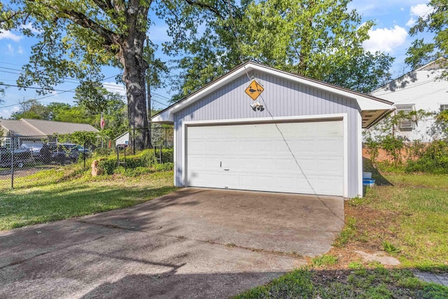 garage with a yard