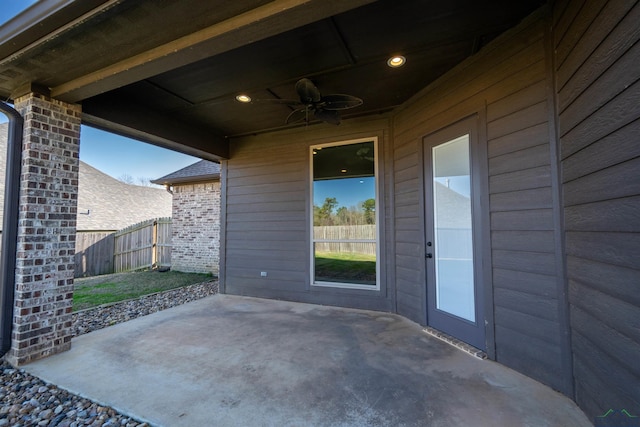 view of patio featuring ceiling fan