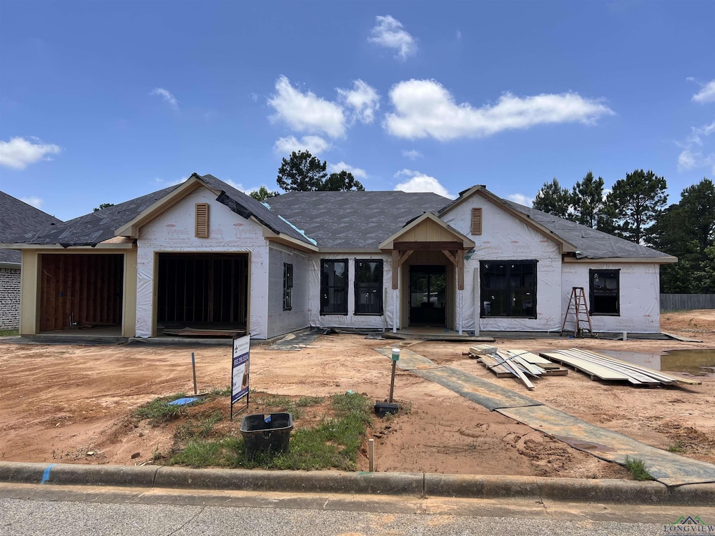 2802 Peregrine Trl, Longview, TX 75605 - property in mid-construction featuring a garage and dirt driveway
