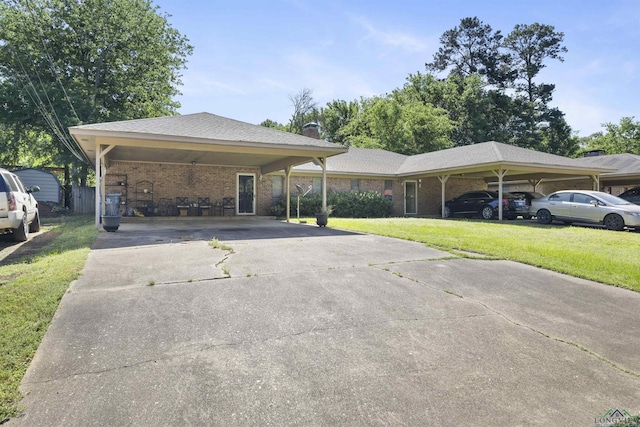 700-702 Pine Burr Ln, Kilgore, TX 75662 - view of parking / parking lot with driveway