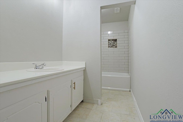 bathroom featuring tile patterned floors and vanity