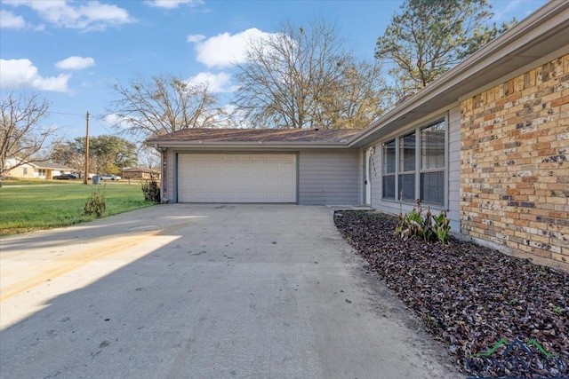 garage with a lawn