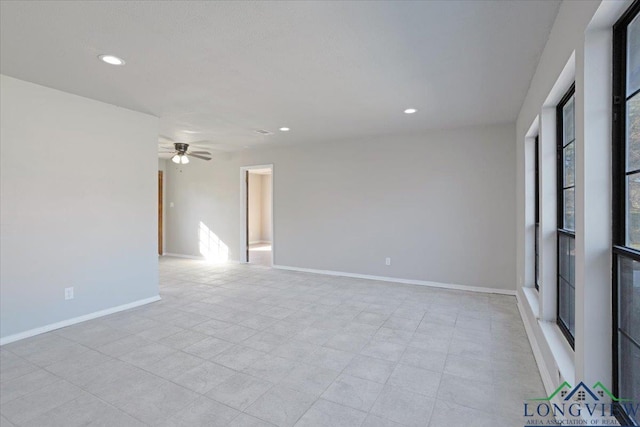 empty room featuring ceiling fan