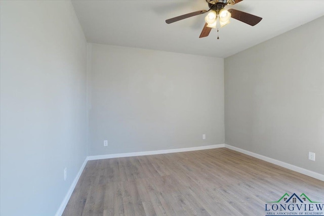 unfurnished room with light hardwood / wood-style flooring and ceiling fan