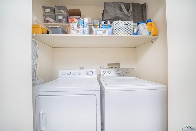 laundry area with washing machine and dryer