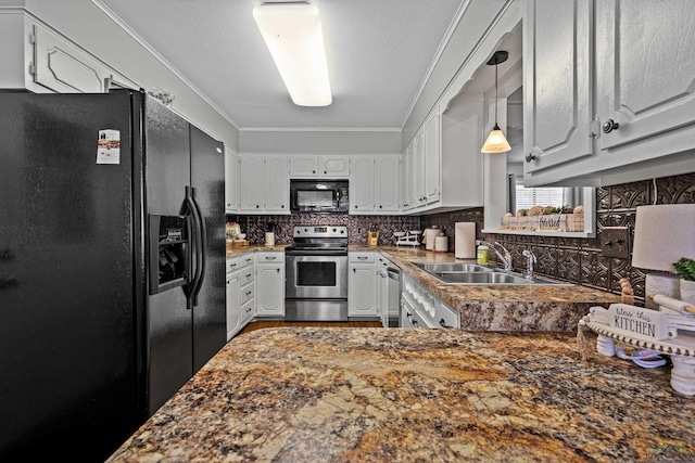 kitchen with black appliances, decorative backsplash, white cabinetry, and sink