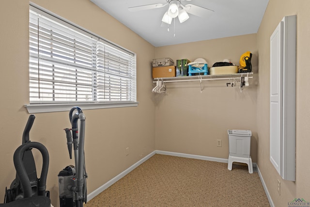 exercise area featuring ceiling fan