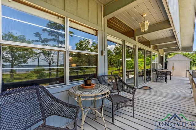 620 Shadywood Ln, Avinger, TX 75630 - wooden terrace featuring a storage shed