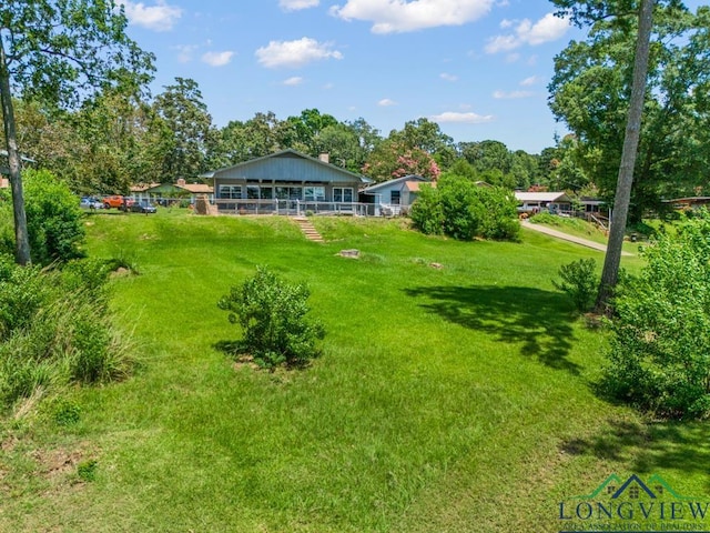 620 Shadywood Ln, Avinger, TX 75630 - view of green lawn with view of wooded area