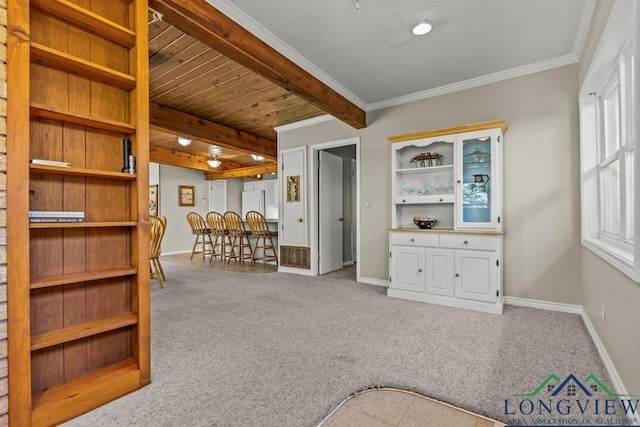 620 Shadywood Ln, Avinger, TX 75630 - living room featuring beamed ceiling, carpet flooring, and ornamental molding