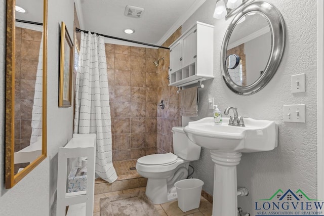 620 Shadywood Ln, Avinger, TX 75630 - bathroom with tiled shower, crown molding, and a textured wall