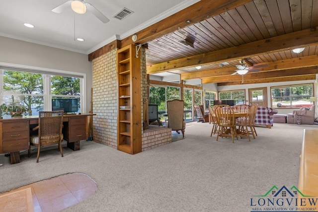 620 Shadywood Ln, Avinger, TX 75630 - home office featuring a ceiling fan, carpet, healthy amount of natural light, beam ceiling, and crown molding