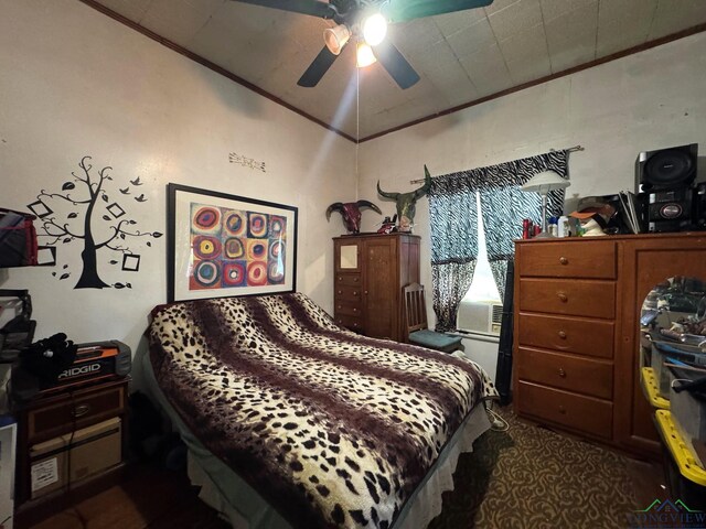 123 E 12th St, Mount Pleasant, TX 75455 - bedroom featuring crown molding, dark carpet, a ceiling fan, and lofted ceiling