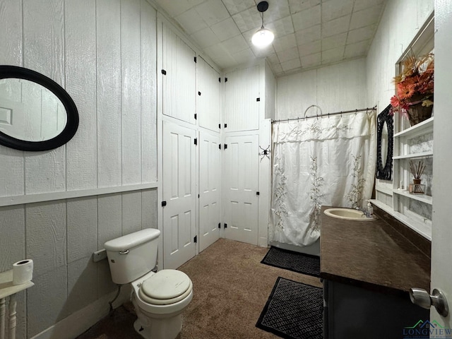 123 E 12th St, Mount Pleasant, TX 75455 - bathroom featuring toilet, vanity, and a shower with curtain