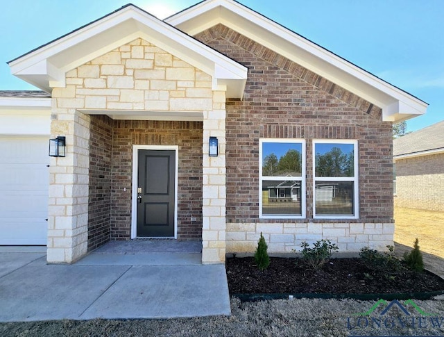 property entrance with a garage