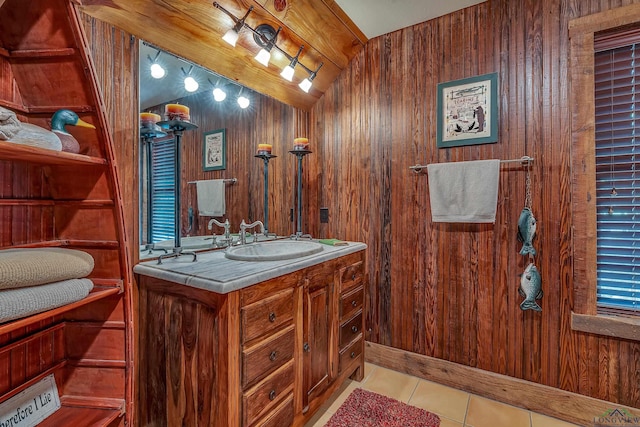 1355 Snapdragon Rd, Diana, TX 75640 - bathroom featuring vanity, wooden walls, tile patterned floors, and vaulted ceiling with beams