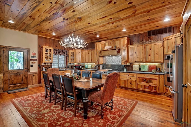 1355 Snapdragon Rd, Diana, TX 75640 - dining space with wooden ceiling, visible vents, light wood-style flooring, and a notable chandelier