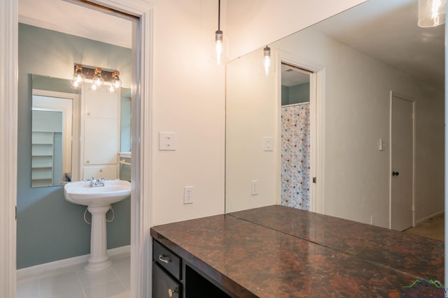 bathroom featuring tile patterned flooring