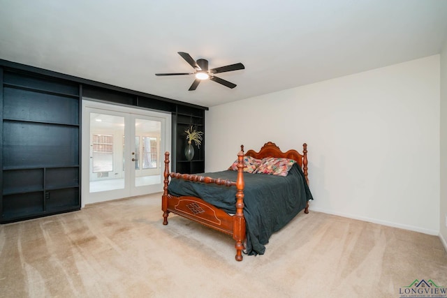 bedroom featuring access to exterior, french doors, carpet floors, and ceiling fan