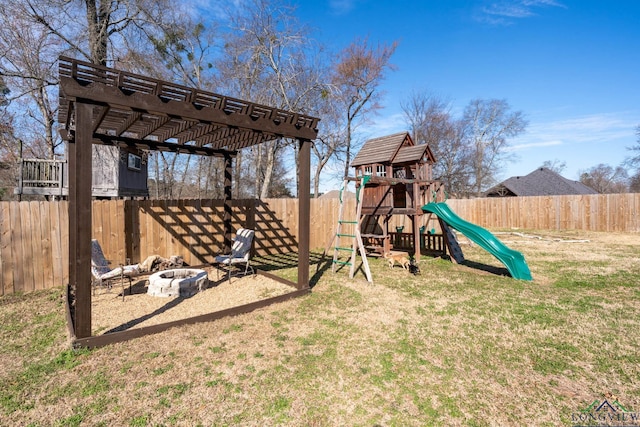 view of playground featuring a fenced backyard, a pergola, and a lawn