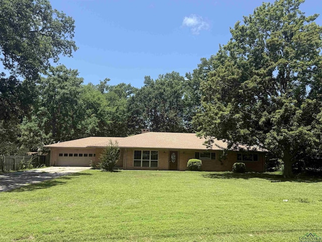 1705 Hyacinth Dr, Longview, TX 75601 - single story home with an attached garage and driveway