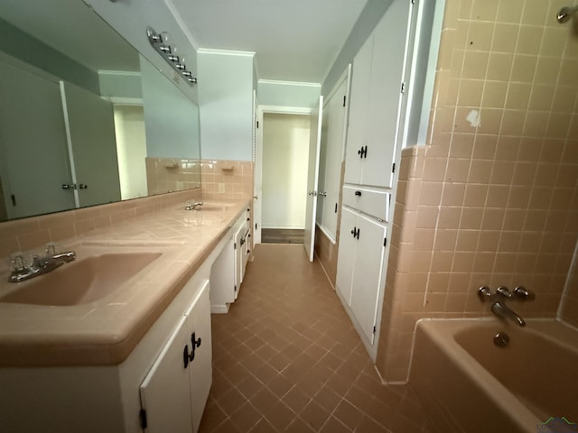 1705 Hyacinth Dr, Longview, TX 75601 - bathroom featuring double vanity and decorative backsplash