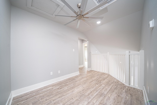 interior space with ceiling fan, light wood-type flooring, and lofted ceiling