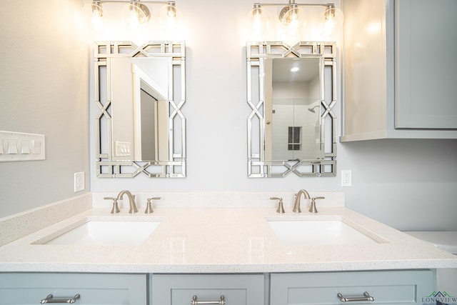 bathroom featuring vanity and walk in shower